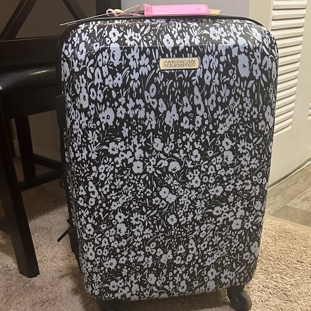Carry On with New Luggage Tags
